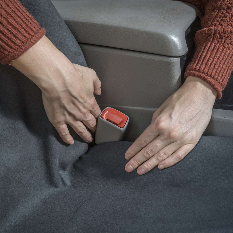 Woman's Hand Tucking in SeatSpin Quick-Dry Cover On Car Seat
